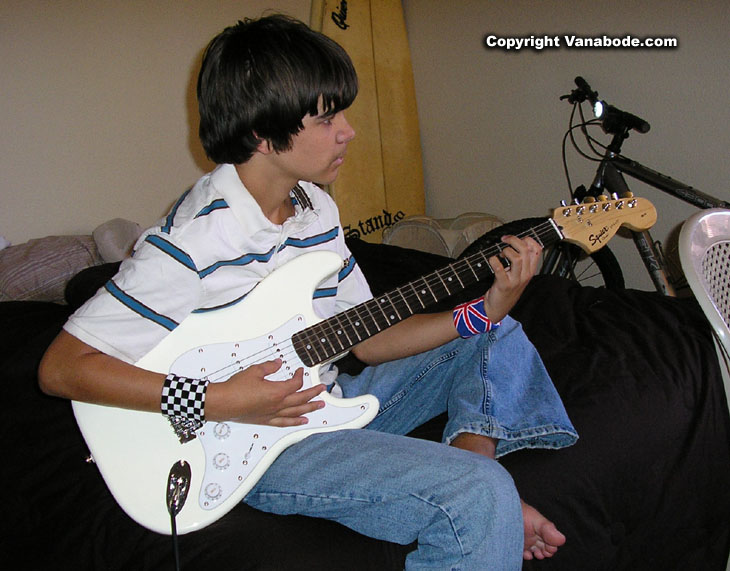 ben playing guitar in condo in las vegas
