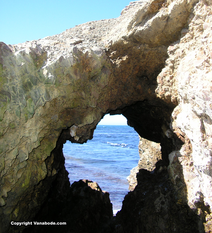 picture of hole in rock along california coast