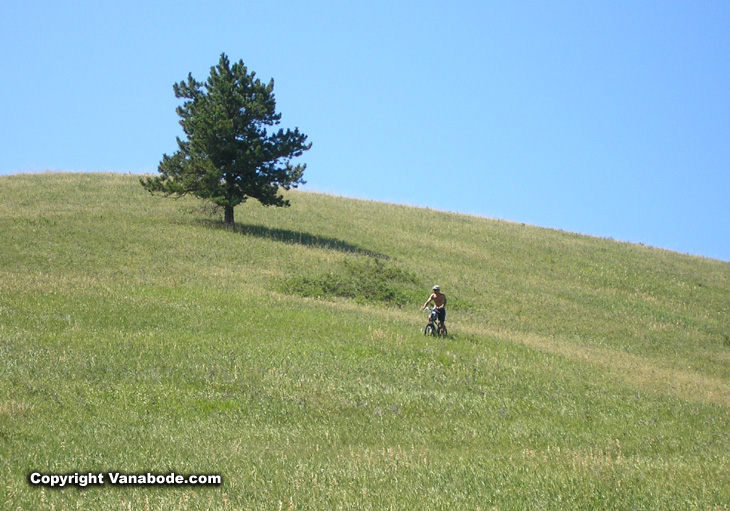 Picture of Jason riding down a large hill